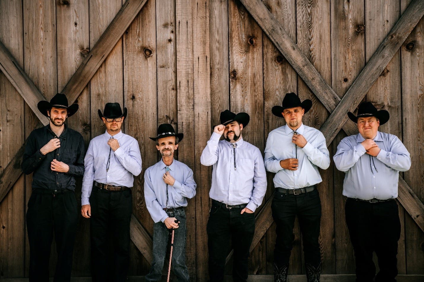 Groomsmen in cowboy hats at a Sonoma County ranch wedding