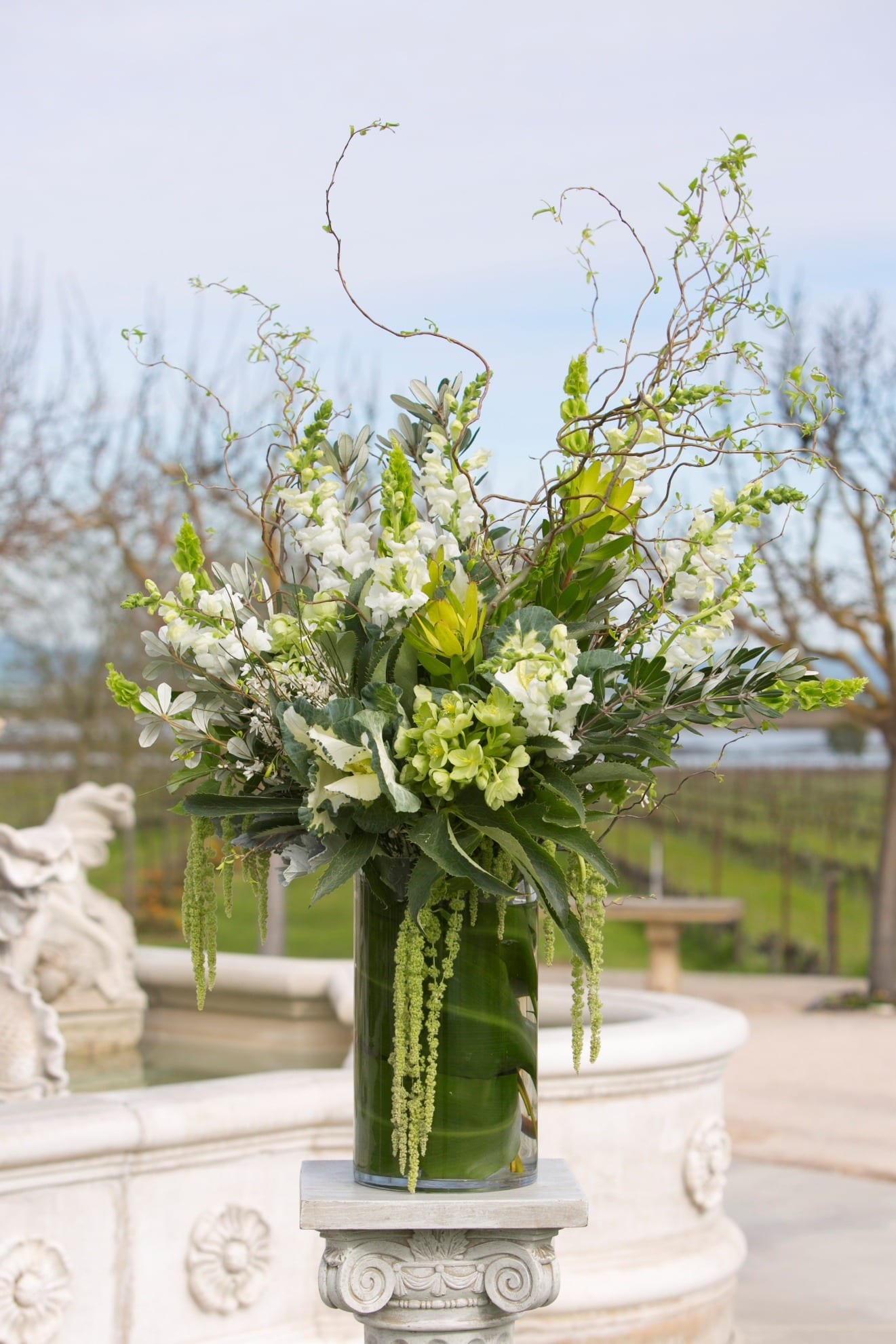 An elegant floral arrangement overlooking the vineyards