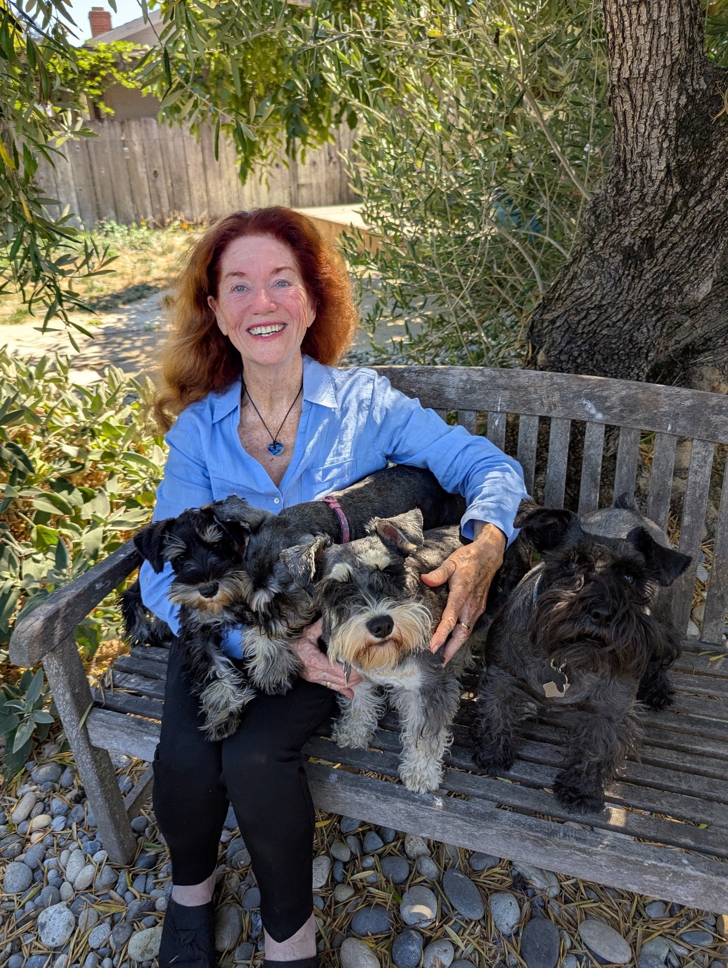 Denise Kramer, founder of Denise Kramer Weddings, with her dogs
